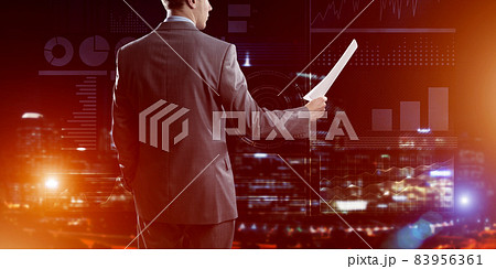 Digital background with infographs and man extending papers or contract 83956361
