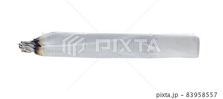 Burning cigarette isolated on white background close up Burning cigarette isolated on white background close up 83958557