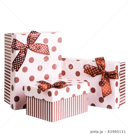 three boxes for gifts, beautiful design, boxes are closed with a lid, on a white background three boxes for gifts, beautiful design, boxes are closed with a lid, on a white background 83960131