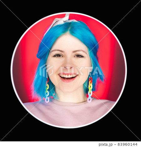 Laughing woman. Charming smile. Positive news. Happy optimistic model giggling face isolated on red neon light background in round black avatar icon frame. Laughing woman. Charming smile. Positive news. Happy optimistic model giggling face isolated on red neon light background in round black avatar icon frame. 83960144