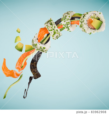 Pieces of delicious japanese sushi frozen in the air. 83962908