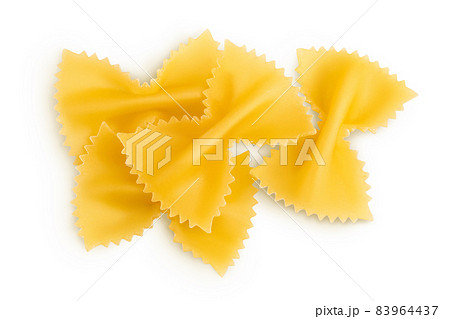 Bow tie pasta isolated on white background with clipping path and full depth of field. Top view. Flat lay. 83964437
