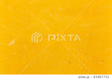 close-up flat texture and background of yellow bakelite or carbolite plastic material 83967732