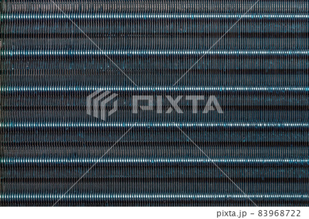 blue hydrophilic coaterd heat radiator - air conditioner evaporator close-up coil texture 83968722