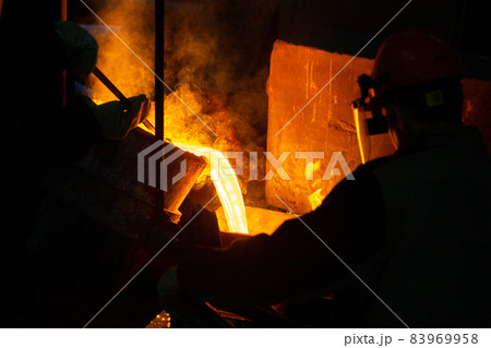 Close-up view of industrial chill casting. The process of for filling out mold with molten metal. 83969958