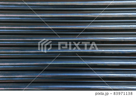 abstract industrial background of shiny cnc turned rods with flat lay horizontal parallel geometric pattern abstract industrial background of shiny cnc turned rods with flat lay horizontal parallel geometric pattern 83971138