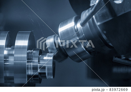 The multi-axis CNC lathe machine cutting the metal CAM shaft part. 83972669
