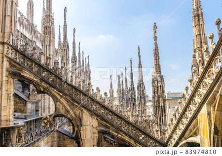 White marble statues on roof of Duomo di Milano Cathedral, Italy White marble statues on roof of Duomo di Milano Cathedral, Italy 83974810
