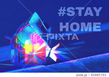 colorful glass prism house on trendy blue background 83985703