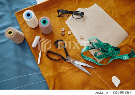 Dressmaking tools on the table, top view, nobody 83990867