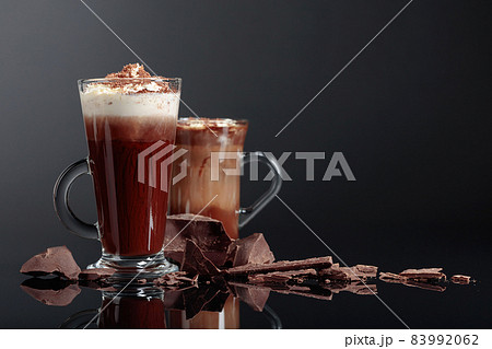 Hot chocolate and pieces of dark chocolate. Hot chocolate and pieces of dark chocolate. 83992062