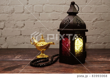 Ramadan Lantern Arabic decoration on wooden background 83993068