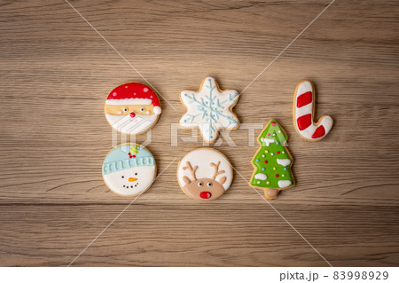 Merry Christmas with homemade cookies on wood table background. Xmas, party, holiday and happy New Year concept 83998929