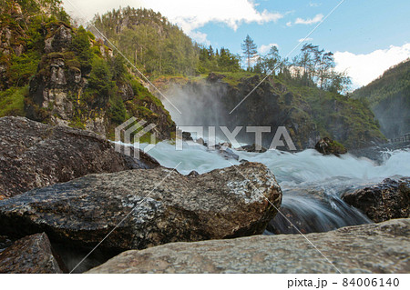 Granite rock and Latefossen or Latefoss - one of the biggest waterfalls in Norway, Scandinavia, Europe Granite rock and Latefossen or Latefoss - one of the biggest waterfalls in Norway, Scandinavia, Europe 84006140