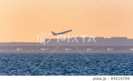 All Nippon Airways plane taking off the runway of Kansai International Airport All Nippon Airways plane taking off the runway of Kansai International Airport 84010766