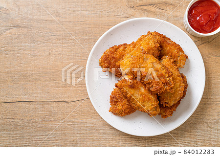 fried chicken wings with ketchup fried chicken wings with ketchup 84012283