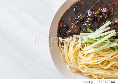 Jajangmyeon or JJajangmyeon is Korean Noodle with Black Sauce Jajangmyeon or JJajangmyeon is Korean Noodle with Black Sauce 84012388