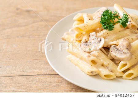 penne pasta carbonara cream sauce with mushroom penne pasta carbonara cream sauce with mushroom 84012457