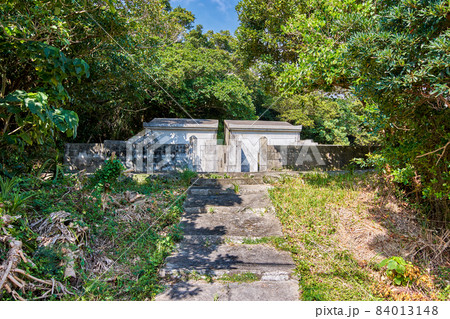 Old traditional Turtle-back tombs commonly found in Okinawa, Japan 84013148