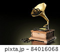 Old antique Gramophone or Phonograph and black music notes in dark black background. It's a popular mythical music player. It works by wind up. The concept of music and aesthetics. 84016068