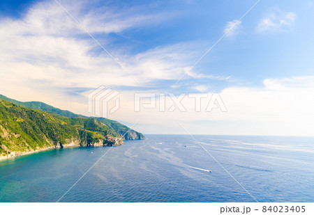 Aerial top panoramic view of Manarola village on cliff and Gulf of Genoa, Ligurian Sea Aerial top panoramic view of Manarola village on cliff and Gulf of Genoa, Ligurian Sea 84023405