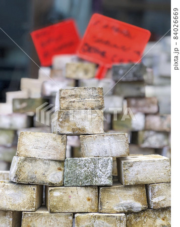 stack of handmade natural soap bars with labels 84026669