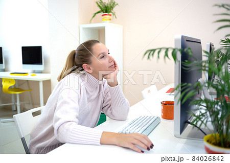 young woman is sad at the workplace. office work concep young woman is sad at the workplace. office work concep 84026842