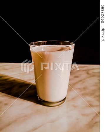 Milk in a glass Milk in a glass 84027860