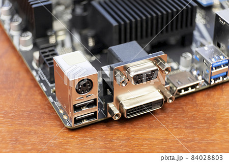 Computer motherboard. Close-up of external connectors. Horizontal photo Computer motherboard. Close-up of external connectors. Horizontal photo 84028803