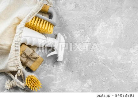 flat lay eco friendly cleaning products with brushes copy space. High quality beautiful photo concept 84033893