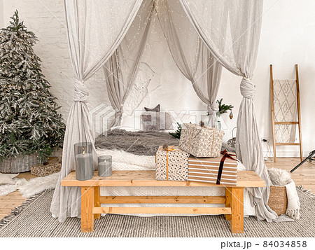 Christmas stylish morning bedroom with fir tree Christmas stylish morning bedroom with fir tree 84034858