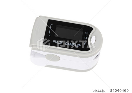 Pulse oximeter on white background.Medical diagnostic device for non-invasive measurement of capillary blood oxygen saturation level. Pulse oximeter on white background.Medical diagnostic device for non-invasive measurement of capillary blood oxygen saturation level. 84040469