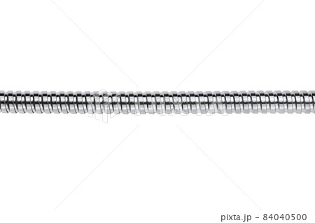 Shower hose on a white background. Silver shower hose close-up. 84040500