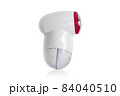 Lint remover on a white background. Electric lint remover close-up on a white background. 84040510