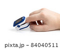 Pulse oximeter on white background.Medical diagnostic device for non-invasive measurement of capillary blood oxygen saturation level. Medical device on the finger. 84040511