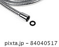 Shower hose on a white background. Silver shower hose close-up. 84040517