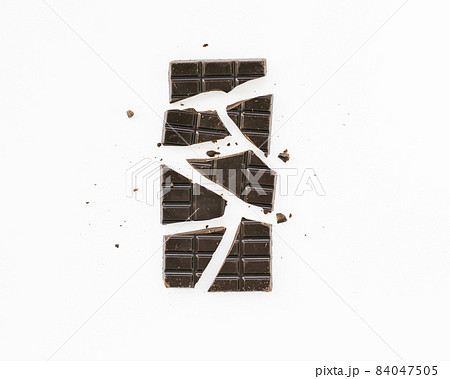 flat lay minimalist chocolate bar. High quality beautiful photo concept flat lay minimalist chocolate bar. High quality beautiful photo concept 84047505