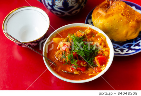 Traditional dish of Central Asian cuisine is Lagman Traditional dish of Central Asian cuisine is Lagman 84048508