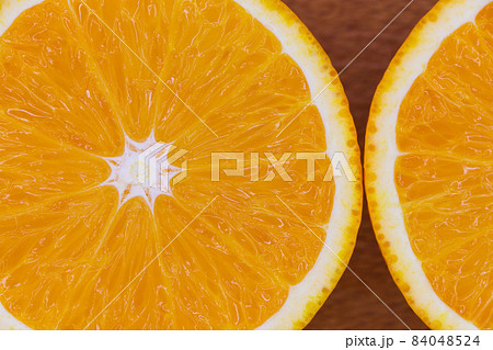 Valencia Orange Citrus Fruit Slices Flat-lay Close-up (Citrus x sinensis) Valencia Orange Citrus Fruit Slices Flat-lay Close-up (Citrus x sinensis) 84048524