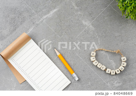 Notebook office work on gray marble background Notebook office work on gray marble background 84048669