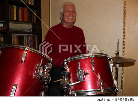 Drums conceptual image. Picture of drums and drumsticks lying on snare drum. Drums conceptual image. Picture of drums and drumsticks lying on snare drum. 84048899