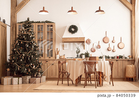 Festive christmas modern kitchen with big tree 84050339