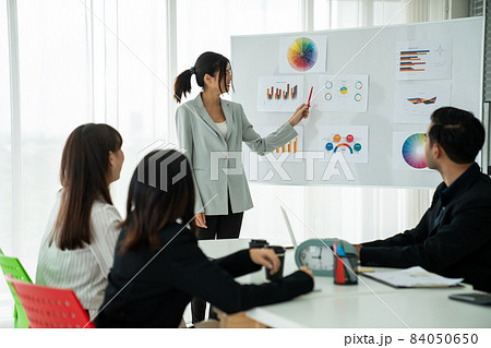 Business people proficiently discuss work project while sitting in circle Business people proficiently discuss work project while sitting in circle 84050650