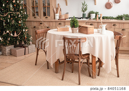 Festive christmas modern kitchen with big tree 84051168