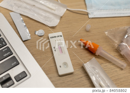 Rapid antigen covid self-test kit on the table Rapid antigen covid self-test kit on the table 84058802
