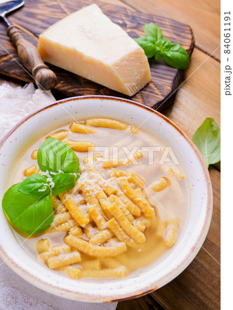 Italian soup. Parmesan Pasta Passatel. Traditional Italian food from the northern regions. Italian soup. Parmesan Pasta Passatel. Traditional Italian food from the northern regions. 84061191