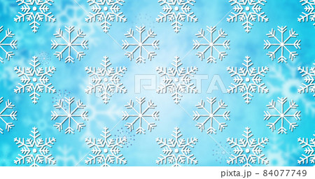 Image of falling snowflakes on blue background 84077749