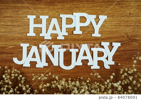 Happy January alphabet letter with space copy on wooden background 84078091