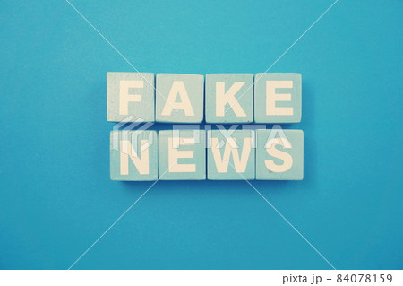 Fake News word alphabet letters on wooden background; Fake News word alphabet letters on wooden background; 84078159