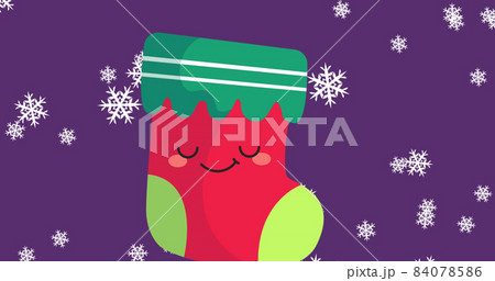 Image of christmas smiling christmas stocking and snowflakes falling over purple background 84078586